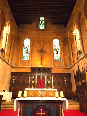Our Lady - altar , crucifix and 3 stained glass windows.jpg
