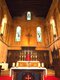 Our Lady - altar , crucifix and 3 stained glass windows.jpg