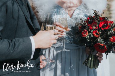 Amanda-Randell-red-and-black-wedding-bouquet-with-grey-silk-ribbon.jpg