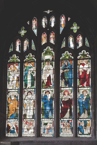 The William Morris window, behind the altar of St Mary Magdalene Chapel, erected 1876 as a memorial to John Hornbrook Gill, of Bickham Hall, a local banker and magistrate, whose son.jpg