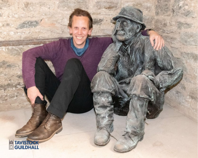 Richard Rundell with statue of a miner